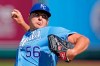 Kansas City Royals starting pitcher Brad Keller throws during the first inning of game one of a baseball doubleheader against the Cincinnati Reds Wednesday, Aug. 19, 2020, in Kansas City, Mo. (AP Photo/Charlie Riedel)