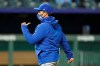 Toronto Blue Jays manager Charlie Montoyo walks back to the dugout after making a pitching change during the fourth inning of a baseball game against the Kansas City Royals, Thursday, April 15, 2021, in Kansas City, Mo. (AP Photo/Charlie Riedel)