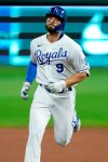 Kansas City Royals' Ryan McBroom rounds the bases after hitting a solo home run during the sixth inning of a baseball game against the Chicago White Sox Friday, July 31, 2020, in Kansas City, Mo. (AP Photo/Charlie Riedel)