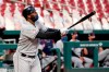 Cleveland Indians' Franmil Reyes watches his three-run home run during the first inning of a baseball game against the St. Louis Cardinals Friday, Aug. 28, 2020, in St. Louis. (AP Photo/Jeff Roberson)