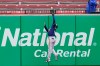Milwaukee Brewers center fielder Jackie Bradley Jr. leaps to catch a fly ball by St. Louis Cardinals' Justin Williams for an out during the eighth inning of a baseball game Saturday, April 10, 2021, in St. Louis. (AP Photo/Jeff Roberson)