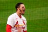 St. Louis Cardinals' Nolan Arenado celebrates after hitting a two-run home run during the eighth inning of a baseball game against the Milwaukee Brewers Thursday, April 8, 2021, in St. Louis. (AP Photo/Jeff Roberson)
