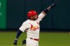 St. Louis Cardinals' Yadier Molina celebrates after hitting an RBI double during the third inning of a baseball game against the Cincinnati Reds Friday, April 23, 2021, in St. Louis. (AP Photo/Jeff Roberson)
