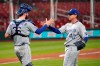 Kansas City Royals relief pitcher Trevor Rosenthal (40) and catcher Cam Gallagher celebrate a 5-4 victory over the St. Louis Cardinals in a baseball game Tuesday, Aug. 25, 2020, in St. Louis. (AP Photo/Jeff Roberson)