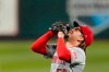 Cincinnati Reds starting pitcher Luis Castillo celebrates after throwing a complete baseball game against the St. Louis Cardinals Friday, Sept. 11, 2020, in St. Louis. The Reds won 3-1. (AP Photo/Jeff Roberson)