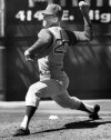FILE - In this 1961 photo, Lew Krausse pitches for the Kansas City Athletics in 1961. Krausse, who pitched 12 years in the major leagues and started the first game in Milwaukee Brewers history, has died. He was 77. Chad Krausse, Lew’s youngest son, said his father died Tuesday, Feb. 16, 2021, of complications from cancer while in hospice care. (The Kansas City Star via AP)