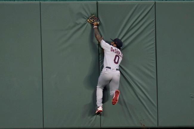 Cleveland Indians center fielder Delino DeShields catches a fly ball hit by Kansas City Royals' Maikel Franco during the second inning of a baseball game at Kauffman Stadium in Kansas City, Mo., Wednesday, Sept. 2, 2020. (AP Photo/Orlin Wagner)