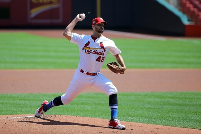 St. Louis Cardinals starting pitcher Adam Wainwright delivers during the first inning of a baseball game Cleveland Indians, Sunday, Aug. 30, 2020, in St. Louis. (AP Photo/Scott Kane)