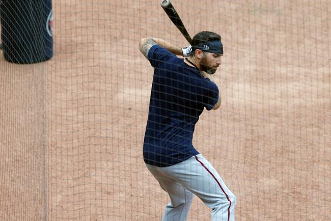 Minnesota Twins third baseman Josh Donaldson takes a practice swing during baseball practice Wednesday, July 8, 2020, in Minneapolis. The baseball team added Donaldson among a couple of potentially high impact players to the team that won 101 games last season. (AP Photo/Jim Mone)