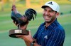 Sergio Garcia, of Spain, holds the Sanderson Farms Championship trophy after winning the PGA golf tournament in Jackson, Miss., Sunday, Oct. 4, 2020. (AP Photo/Rogelio V. Solis)