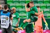 David Siger, right, and Ihor Kharatin of Ferencvaros celebrate their win against Dinamo Zagreb after the Champions' League qualifying third round soccer match between Ferencvaros and Dinamo Zagreb in Groupama Arena in Budapest, Hungary, Wednesday, Sept. 16, 2020. (Szilard Koszticsak/MTI via AP)