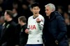 Tottenham's manager Jose Mourinho, right, talks with his player Tottenham's Son Heung-min during the English Premier League soccer match between Tottenham Hotspur and Norwich City at the Tottenham Hotspur Stadium in London, England, Wednesday, Jan. 22, 2020. (AP Photo/Matt Dunham)