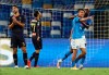 Napoli's Hirving Lozano, second from right, celebrates with Victor Osimhen after scoring his side's 4th goal during the Serie A soccer match between Napoli and Genoa at the San Paolo Stadium in Naples, Italy, Sunday, Sept. 27, 2020. (Alessandro Garofalo/LaPresse via AP)