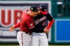 Arizona Diamondbacks third baseman Asdrúbal Cabrera, left, hugs Washington Nationals left fielder Juan Soto before a baseball game at Nationals Park, Thursday, April 15, 2021, in Washington. (AP Photo/Alex Brandon)