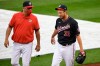 Washington Nationals starting pitcher Max Scherzer (31) walks on the field next to pitching coach Paul Menhart, left, before a baseball game against the New York Mets, Friday, Sept. 25, 2020, in Washington. The game was postponed due to inclement weather. (AP Photo/Nick Wass)