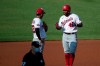 Washington Nationals shortstop Luis Garcia, left, talks with Howie Kendrick as he stands on second base during a baseball intrasquad game at Nationals Park, Thursday, July 16, 2020, in Washington. (AP Photo/Alex Brandon)