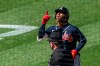 Atlanta Braves' Ozzie Albies, top, gestures as he rounds bases after hitting a two-run home run during the sixth inning of a baseball game against the Washington Nationals in Washington, Sunday, Sept. 13, 2020. (AP Photo/Manuel Balce Ceneta)