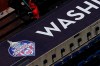 A 2019 World Series champions logo displayed is seen on the top of the dugout during the Washington Nationals baseball practice at Nationals Park, Wednesday, July 22, 2020, in Washington. (AP Photo/Nick Wass)