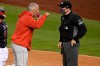 Philadelphia Phillies manager Joe Girardi, left, argues with home plate umpire Junior Valentine, right, after he was ejected during the third inning of a baseball game against the Washington Nationals, Monday, Sept. 21, 2020, in Washington. (AP Photo/Nick Wass)