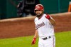 Washington Nationals' Adam Eaton gestures to his dugout as he rounds the bases after hitting a home run during the sixth inning of a baseball game against the Philadelphia Phillies in Washington, Tuesday, Aug. 25, 2020. (AP Photo/Manuel Balce Ceneta)