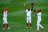 Washington Nationals' Victor Robles, center, Juan Soto, left, and Michael A. Taylor, right, celebrate after the first baseball game of a doubleheader against the Miami Marlins, Saturday, Aug. 22, 2020, in Washington. (AP Photo/Nick Wass)