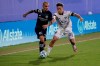Portland Timbers'Pablo Bonilla, right, moves the ball past New York City midfielder Alexandru Mitrita during the first half of an MLS soccer match, Saturday, Aug. 1, 2020, in Kissimmee, Fla. (AP Photo/John Raoux)