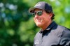 Phil Mickelson smiles to the crowd after the third hole during the first round of the Wells Fargo Championship golf tournament at Quail Hollow on Thursday, May 6, 2021, in Charlotte, N.C. (AP Photo/Jacob Kupferman)