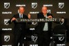 Major League Soccer Commissioner Don Garber, left, and Charlotte MLS team owner David Tepper announce that Major League Soccer will be coming to Charlotte in 2021 at an event in Charlotte, N.C., Tuesday, Dec. 17, 2019. (AP Photo/Nell Redmond