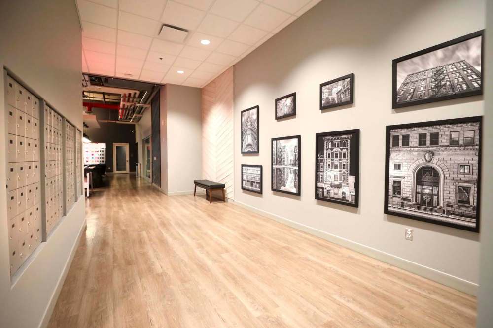 RUTH BONNEVILLE / WINNIPEG FREE PRESS
Historical views of Winnipeg line a hallway.