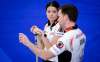 Kerri Einarson and Brad Gushue are trying to win the country's first-ever world mixed doubles title. (Jeff McIntosh / The Canadian Press files)