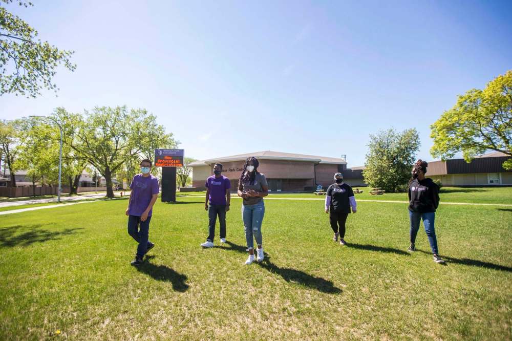 MIKAELA MACKENZIE / WINNIPEG FREE PRESS
Quan Lam (from left), Jean-Pierre Ngegba, Lea Nkana Bassi, Aliyah Jollienne Barila, and Renny Adebooye shared concerns about Bill 64 at a virtual town hall meeting put on by Louis Riel School Division this week.