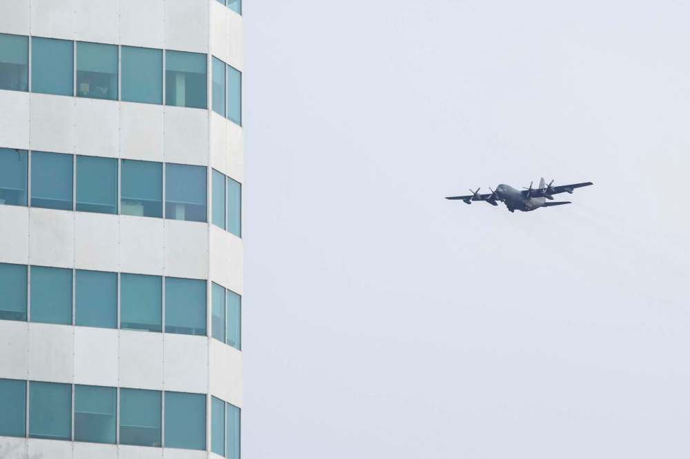 A CC-130H Hercules, outfitted with a special isolation unit and room for six medical specialists, arrived Thursday at CFB Winnipeg in the city's west end. Formally called an aeromedical bio-containment evacuation system, the unit is ready to transport ICU patients for out-of-province care as early as Friday. (Mike Deal / Winnipeg Free Press files)