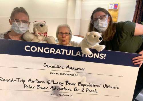 SUPPLIED
At Misericordia Place, recreation facilitator Rael Kulchycki (left) and recreation manager Jennifer Klos flank resident Geraldine Anderson with her ‘cheque&rsquo; for a polar bear trip to Churchill.
