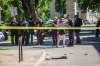 Police investigate the scene of a shooting at Young and Westminster in Winnipeg. (Mikaela MacKenzie / Winnipeg Free Press files)