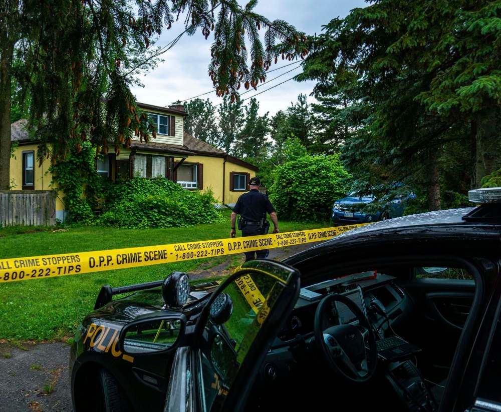 CALDER SIDLEY / WINNIPEG FREE PRESS Police in Prince Edward County, Ont., responded to a tip that homicide suspect Eric Wildman was staying at a home on Massasauga Road in June. Police were able to apprehend Wildman after a standoff and negotiations.