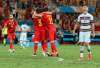 Lluis Gene / Pool Photo via AP
Portugal's Cristiano Ronaldo (right) reacts Sunday as Belgium players celebrate after eliminating the defending champions from Euro 2020.