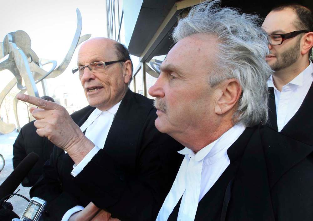 Joe Bryksa / Free Press files
Weinstein, left, and Sheldon Pinx in 2011 after a judge threw out all charges against two Winnipeg police officers accused of lying under oath.