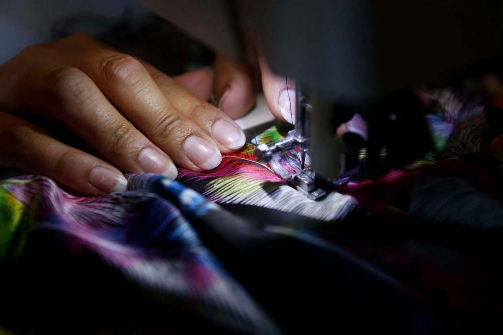 Ojibwa culture plays a big part in what fabric Sinclair purchases for the garments and blankets she designs and sells. (John Woods / Winnipeg Free Press)