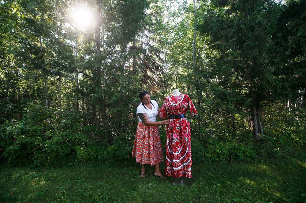Wendy Sinclair of Pretty Windy Designs creates ponchos, blankets, skirts, vests and jackets, using fabrics and designs that are part of her culture. (John Woods / Winnipeg Free Press)