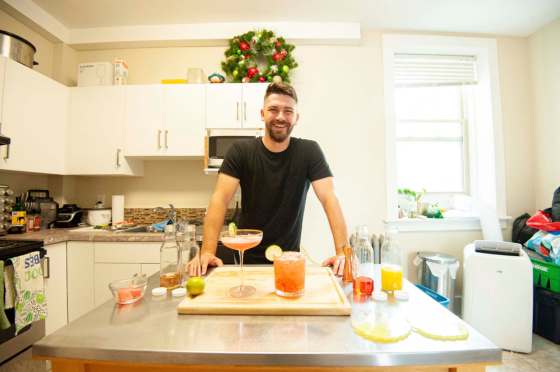 MIKE SUDOMA / Winnipeg Free PressBartender Scott Redfern shows off two new summer cocktail creations, the Summer Rose (left) and the Summer Garden, at his home.