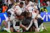 Laurence Griffiths / Pool Photo via AP
England&rsquo;s Harry Kane (bottom) celebrates with his teammates after scoring his side&rsquo;s second goal during the Euro 2020 soccer semifinal between England and Denmark.