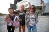 JOHN WOODS / WINNIPEG FREE PRESS
Valour football fans, from left, Lai Guen Woo, Jeannette de Stephanie and Sara Harms, line up to get their vaccination cards/QR codes scanned before they enter the stadium in Winnipeg Wednesday.