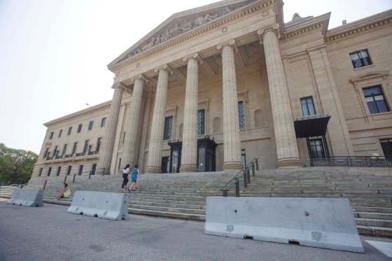 MIKE DEAL / WINNIPEG FREE PRESSConcrete barriers now sit at the bottom of the stairs at the front entrance to the Manitoba Legislative building. The extra security comes after a man drove his pickup truck onto the front steps on July 7th.