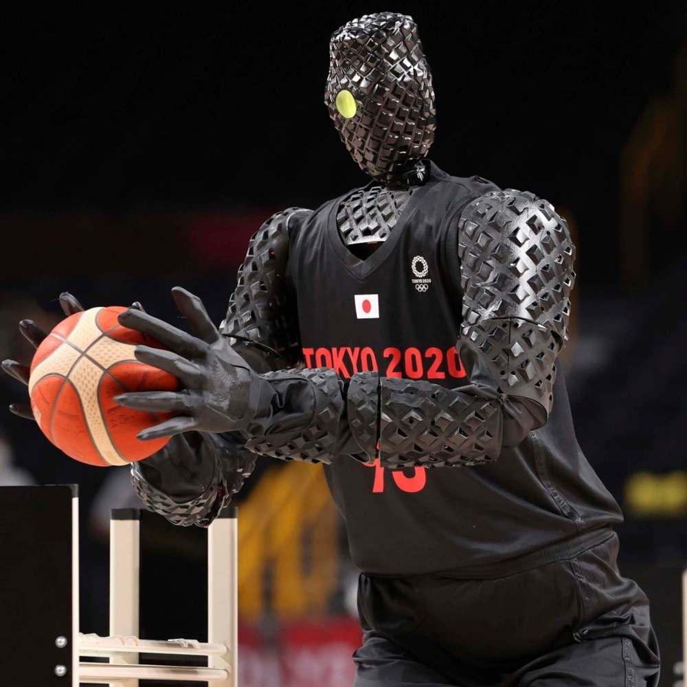 The robot ‘CUE’ takes to the court during halftime of the the 2020 Olympic men’s basketball game between the U.S. and France last weekend.
