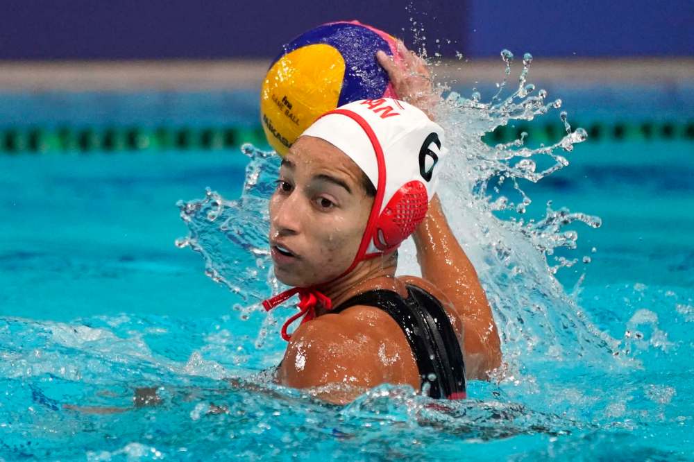 Canada's Gurpreet Sohi plays against South Africa during a preliminary round women's water polo match at the 2020 Summer Olympics, Wednesday, July 28, 2021, in Tokyo, Japan. (AP Photo/Mark Humphrey)