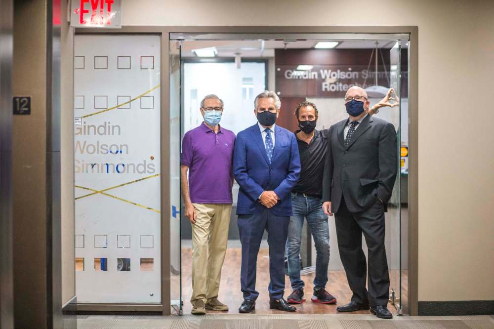 Jeff Gindin (from left), Richard Wolson, Saul Simmonds and Evan Roitenberg are splitting up their law firm after 26 years in business. (Mikaela MacKenzie / Winnipeg Free Press)