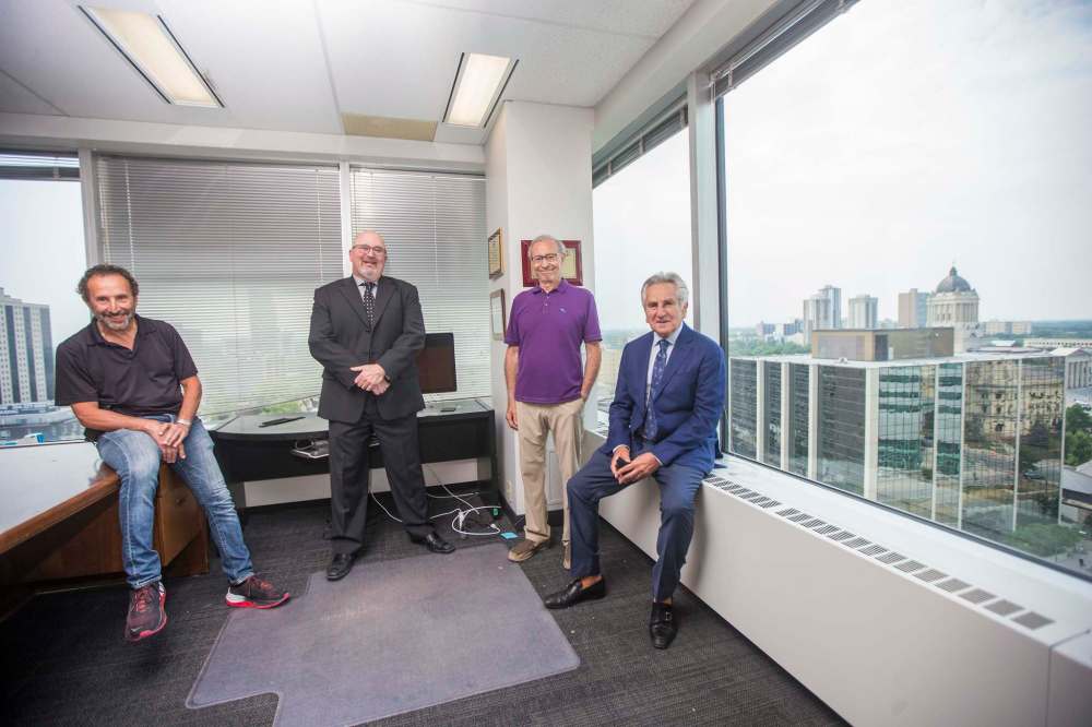 Saul Simmonds (from left), Evan Roitenberg, Jeff Gindin, and Richard Wolson have been involved with some of the province’s most high-profile criminal cases. (Mikaela MacKenzie / Winnipeg Free Press)