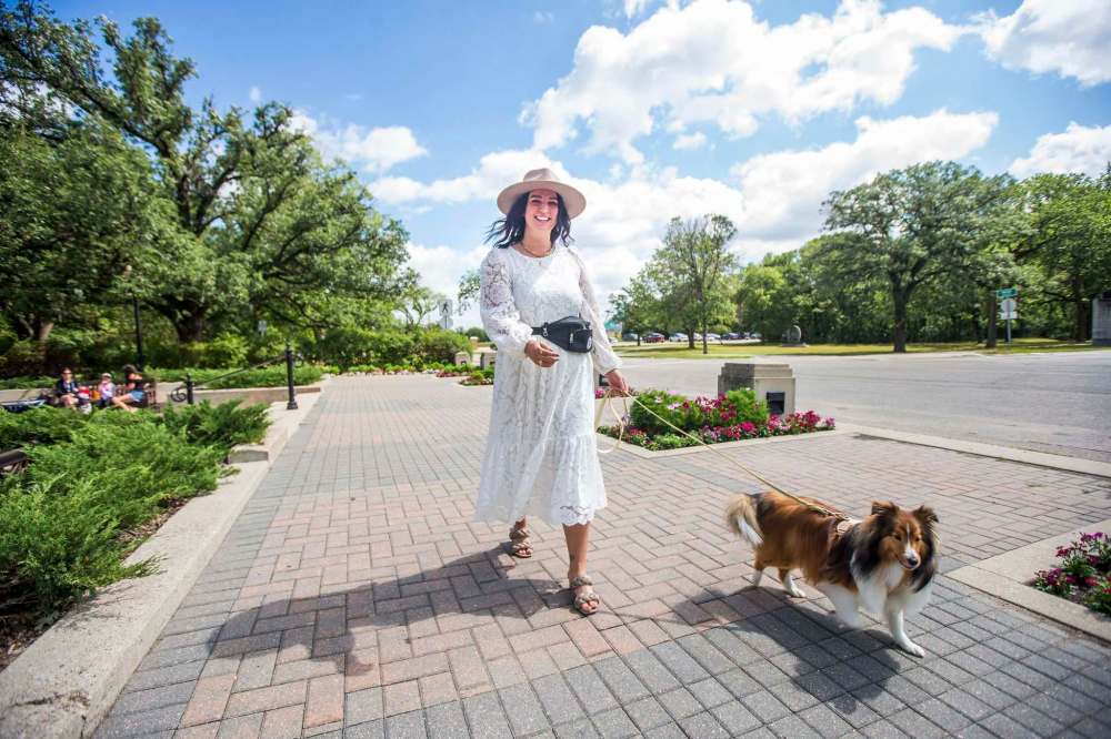 MIKAELA MACKENZIE / WINNIPEG FREE PRESS
Jamie Barber (with her dog Indy) recently started Bark, a doggie wedding-date service, where Barber (or one of her staffers) will take care of a couples’ pooch for the event.