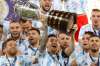 Andre Penner / The Associated Press files
Lionel Messi lifts the trophy as he celebrates with his Argentina teammates after beating Brazil 1-0 in the Copa America final.