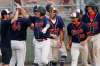 JOHN WOODS / WINNIPEG FREE PRESS
Elmwood Giants’ Owen Harms (6) and his team celebrate his 3-run homer against the Pembina Valley Orioles in the Manitoba Junior Baseball League final in Winnipeg Monday.